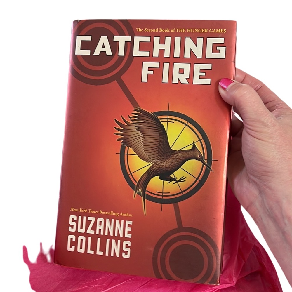 Hardback “Catching Fire” Book by Suzanne Collins.